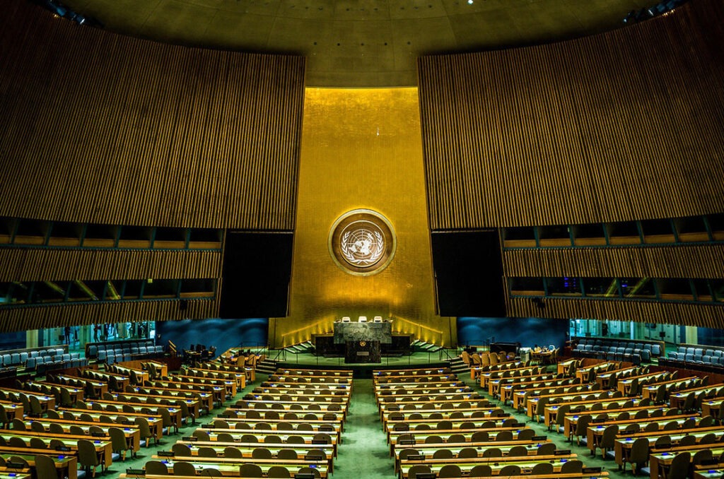 A large room with chairs and tables in it