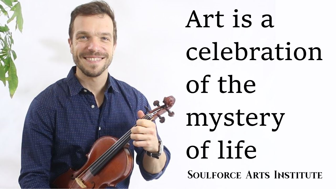 A man holding a violin with a quote on it.