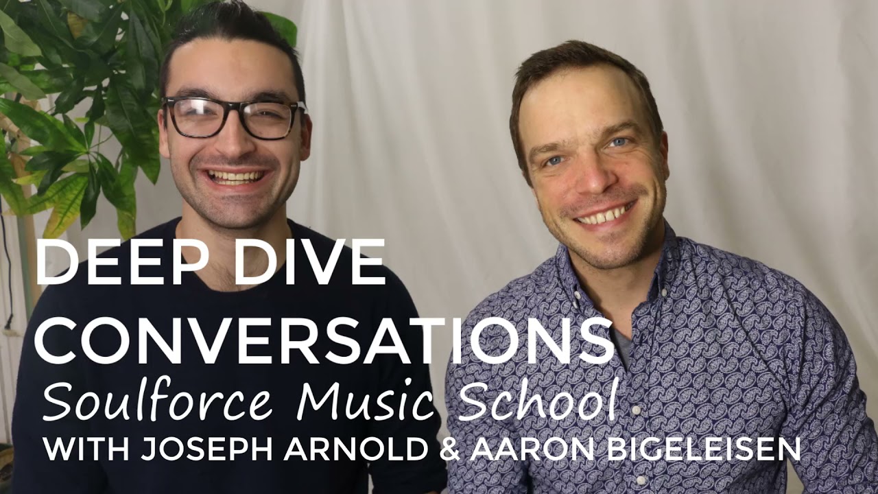 Two men are posing for a picture with the words " top dive conversations."