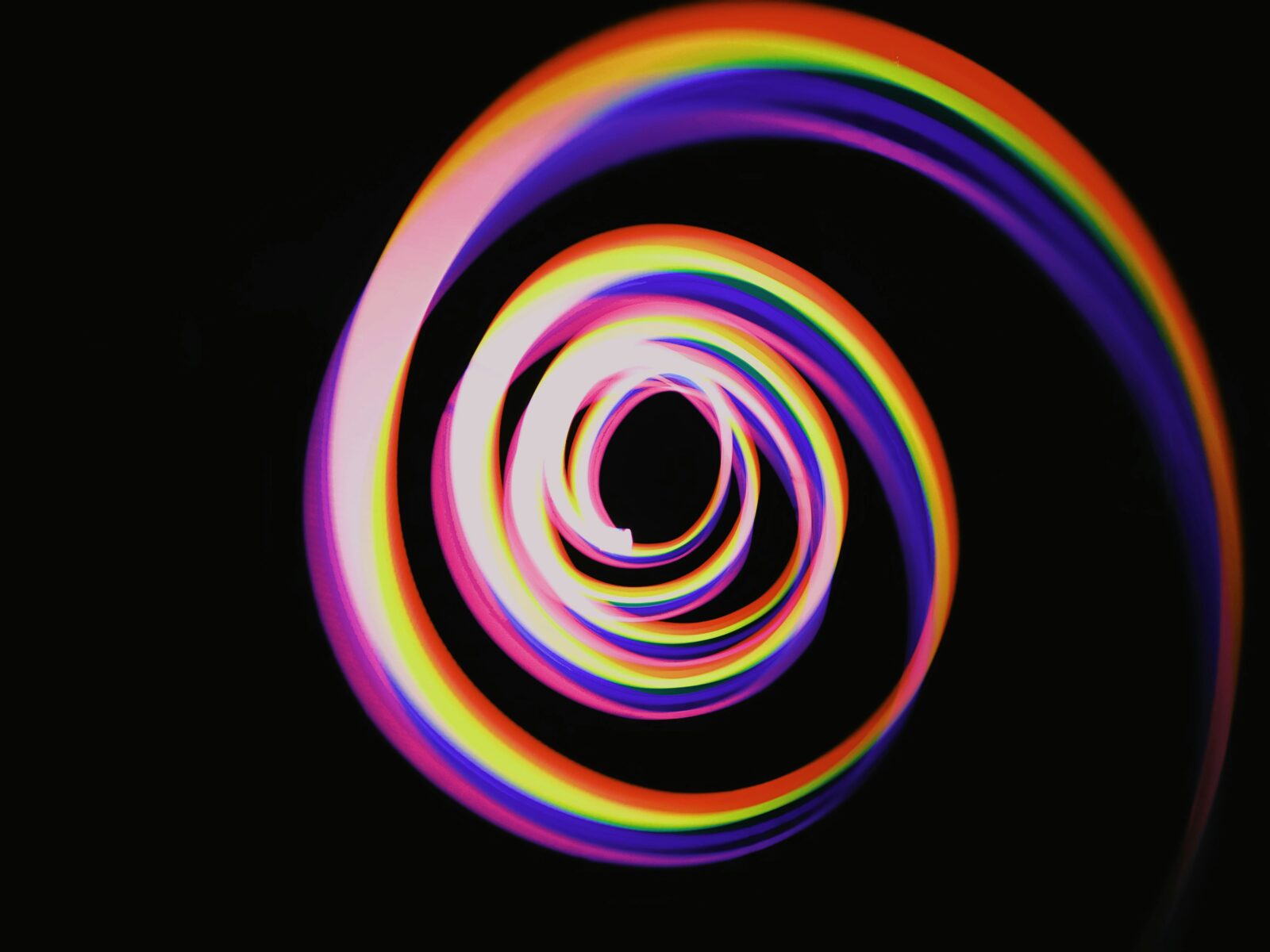 rainbow spiral on a black background